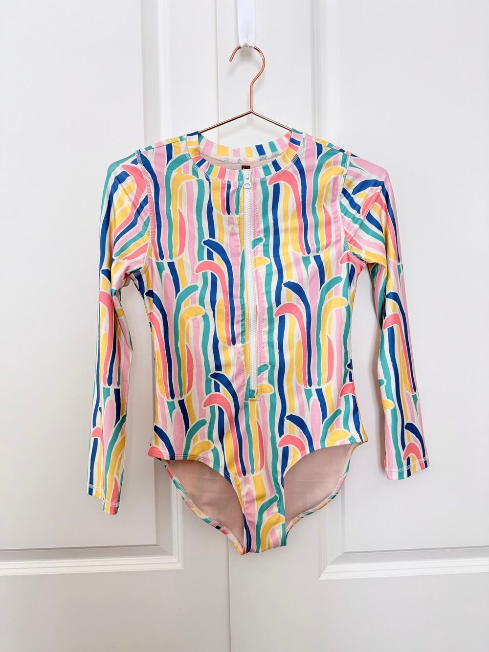 Tea Collection rainbow pineapple abstract print zip front swimsuit rashguard